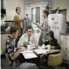 Chuck Cunningham with family in kitchen