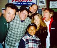 Marc Price at a radio station with Emmanuel 'Webster' Lewis